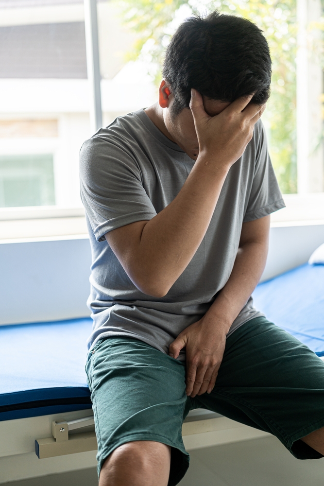 Young,Man,Consulting,Doctor,About,Causes,Of,Erectile,Dysfunction,In